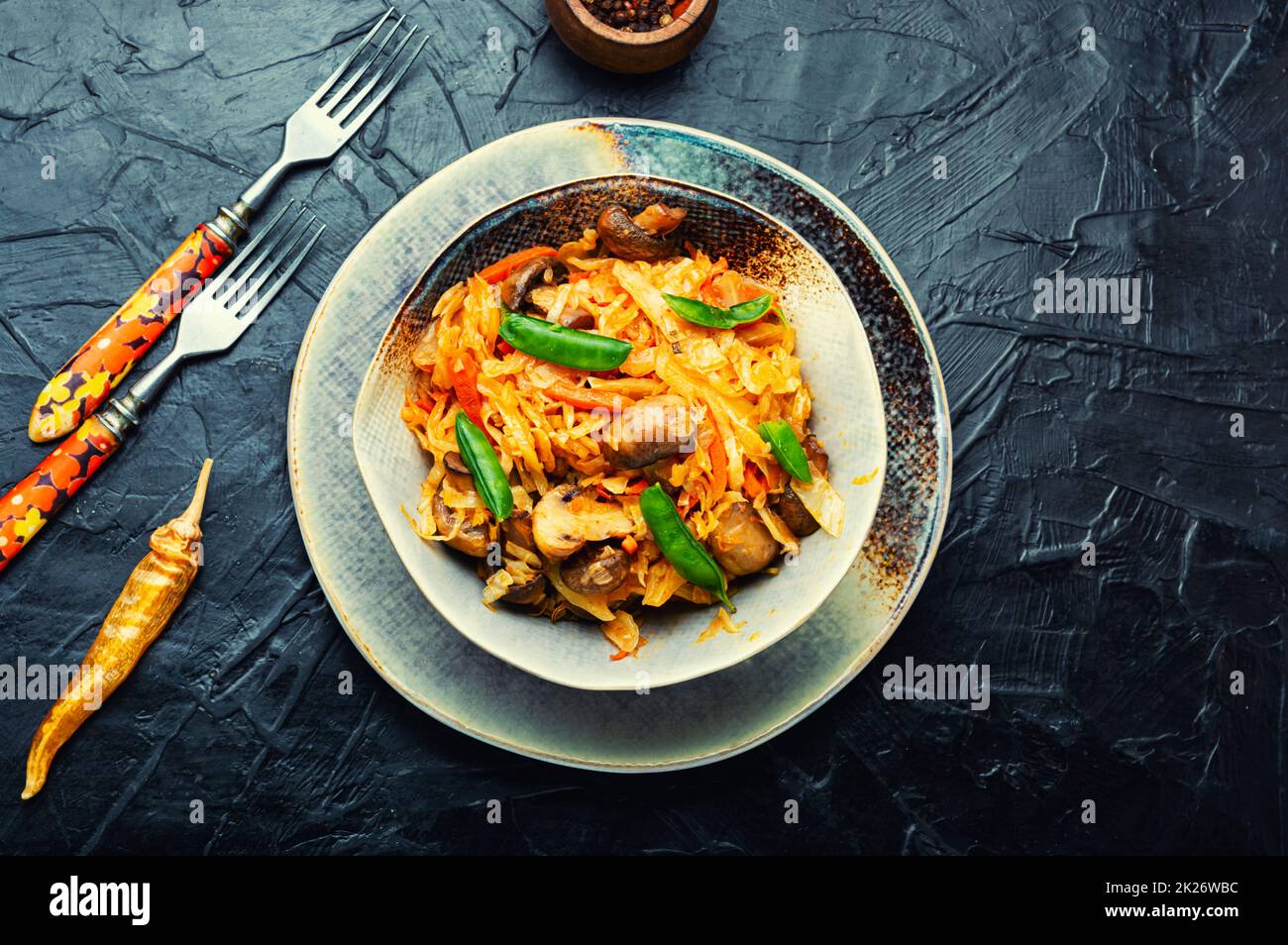 Cabbage stewed with mushrooms ,close up Stock Photo