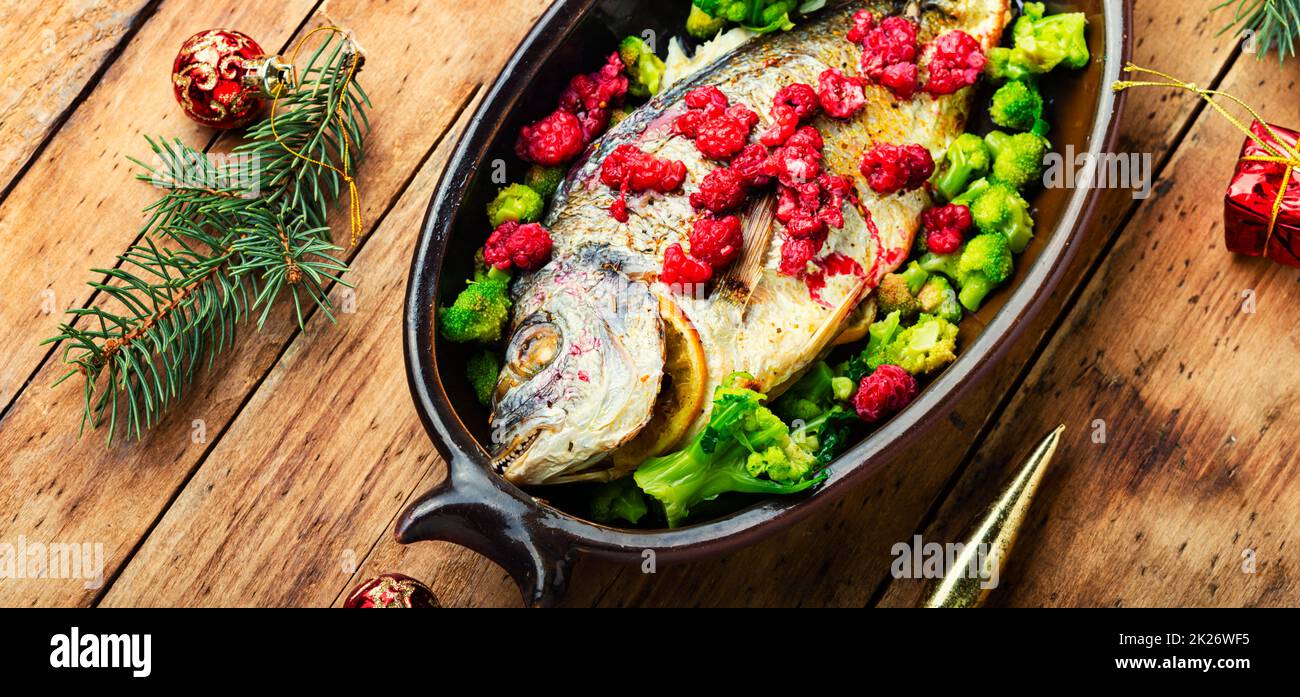 Festive baked fish. Stock Photo