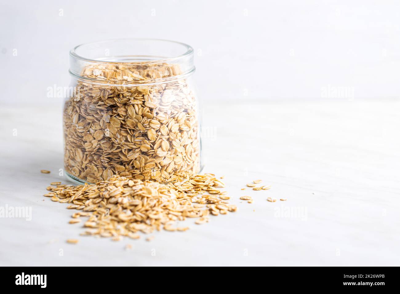 Breakfast cereals. Uncooked oatmeal. Raw oat flakes Stock Photo Alamy