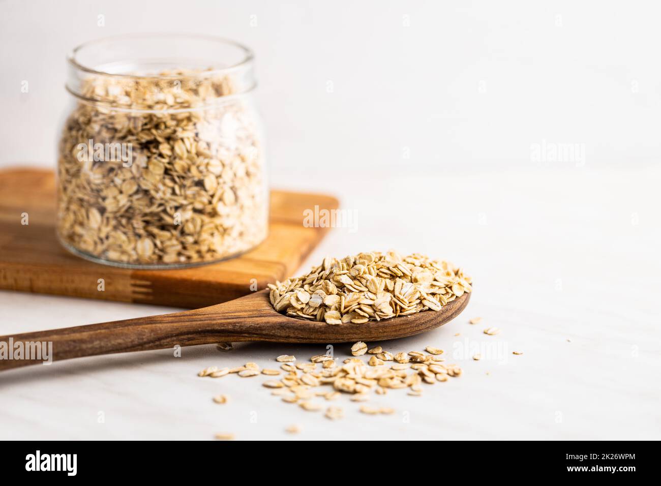 Breakfast cereals. Uncooked oatmeal. Raw oat flakes Stock Photo Alamy
