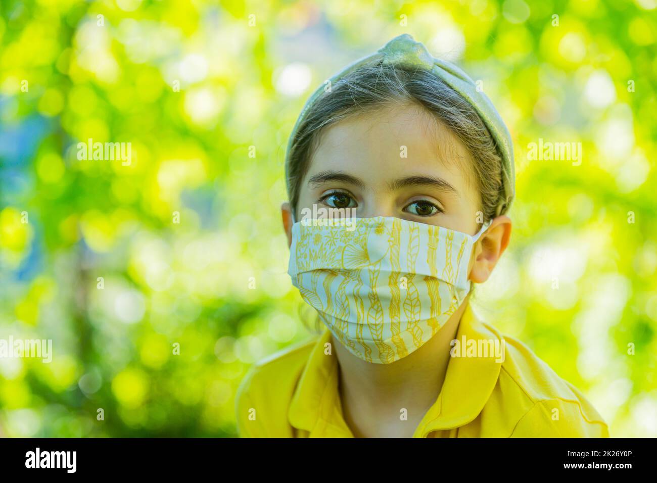 Little girl with mask Stock Photo Alamy