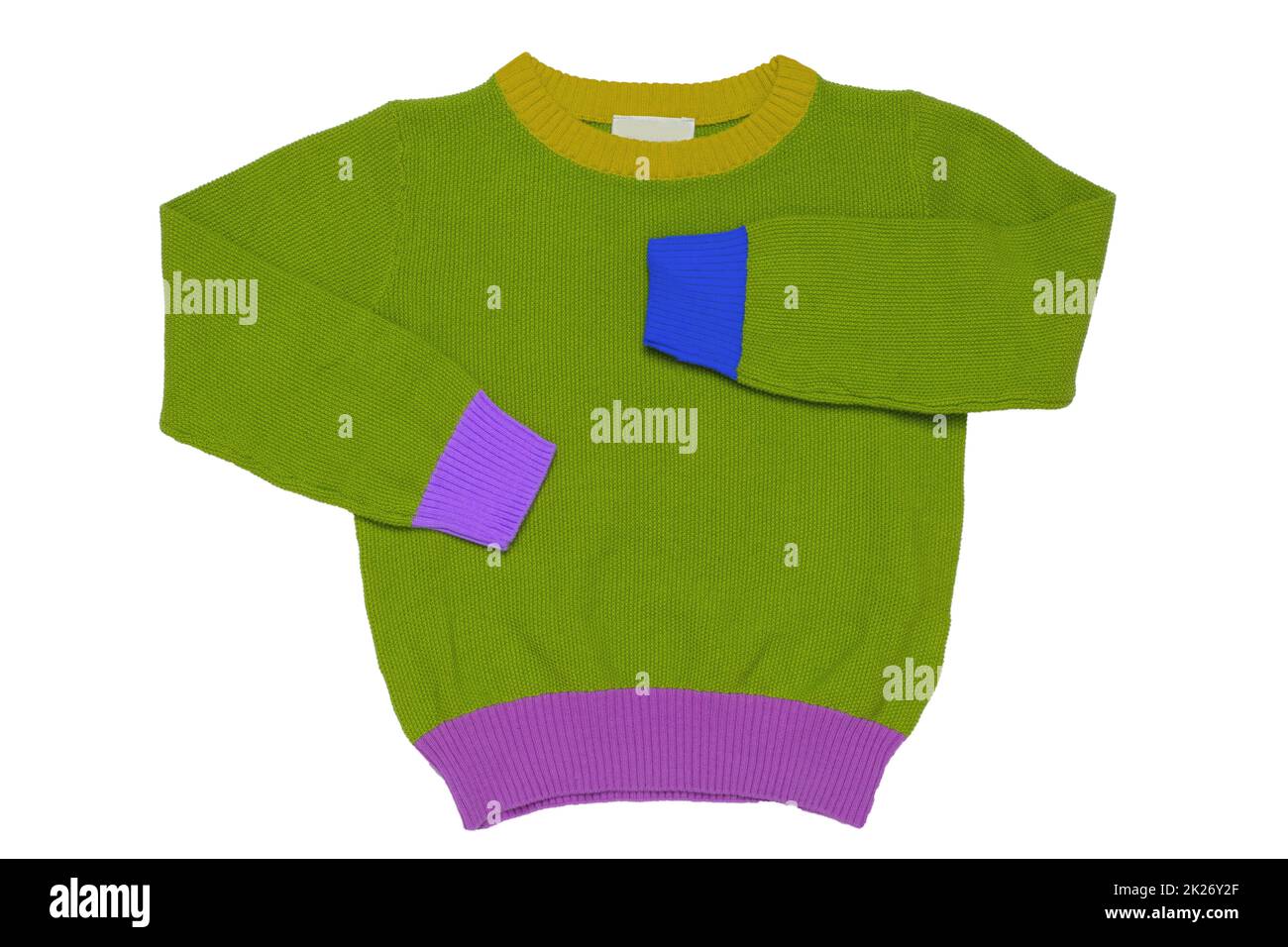 Top view of clothes for child boy isolated on a white background. A beautiful green little child sweater or knitted cardigan. Autumn and winter fashion for kids. Stock Photo
