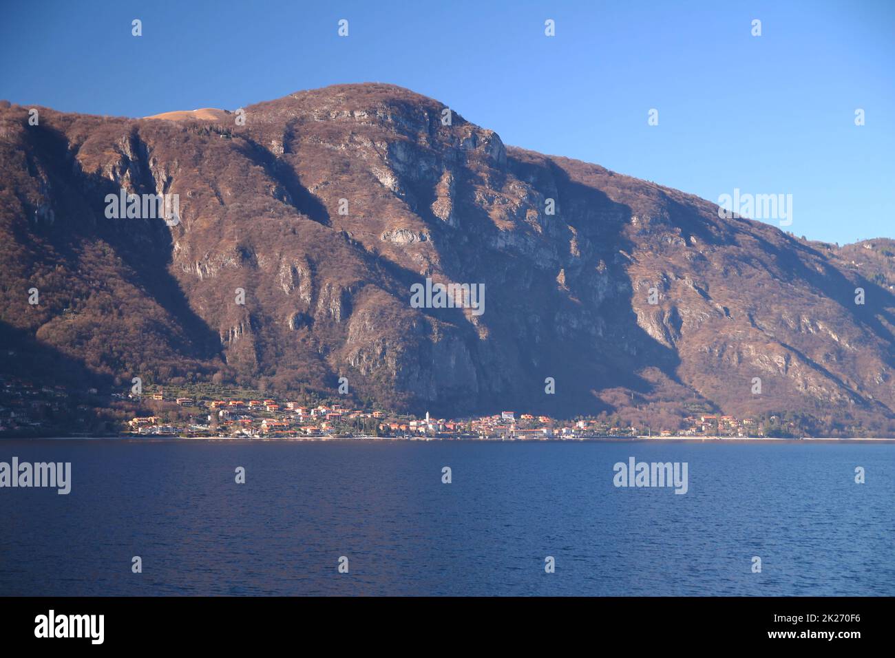 Caption of Oliveto Lario and the alps above taken from Abbadia Lariana on Como Lake Stock Photo