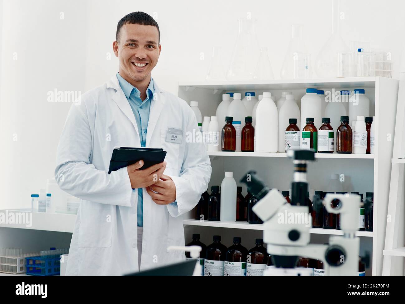 The world will remember his work. Portrait of a confident young scientist working in a modern laboratory. Stock Photo