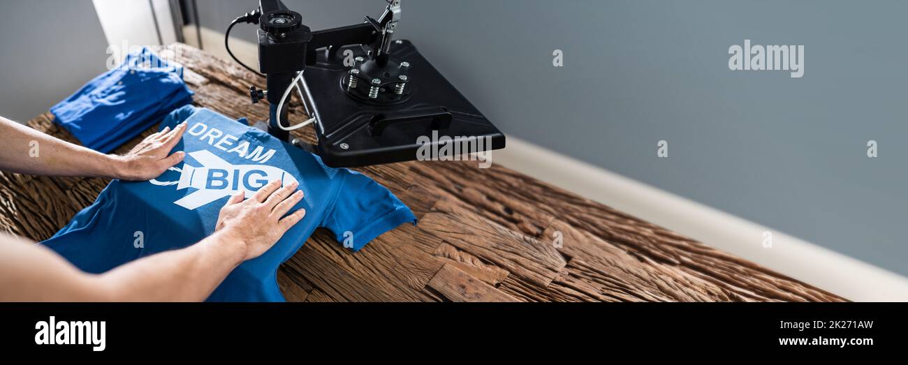 Printing On T-Shirt In Workshop Stock Photo