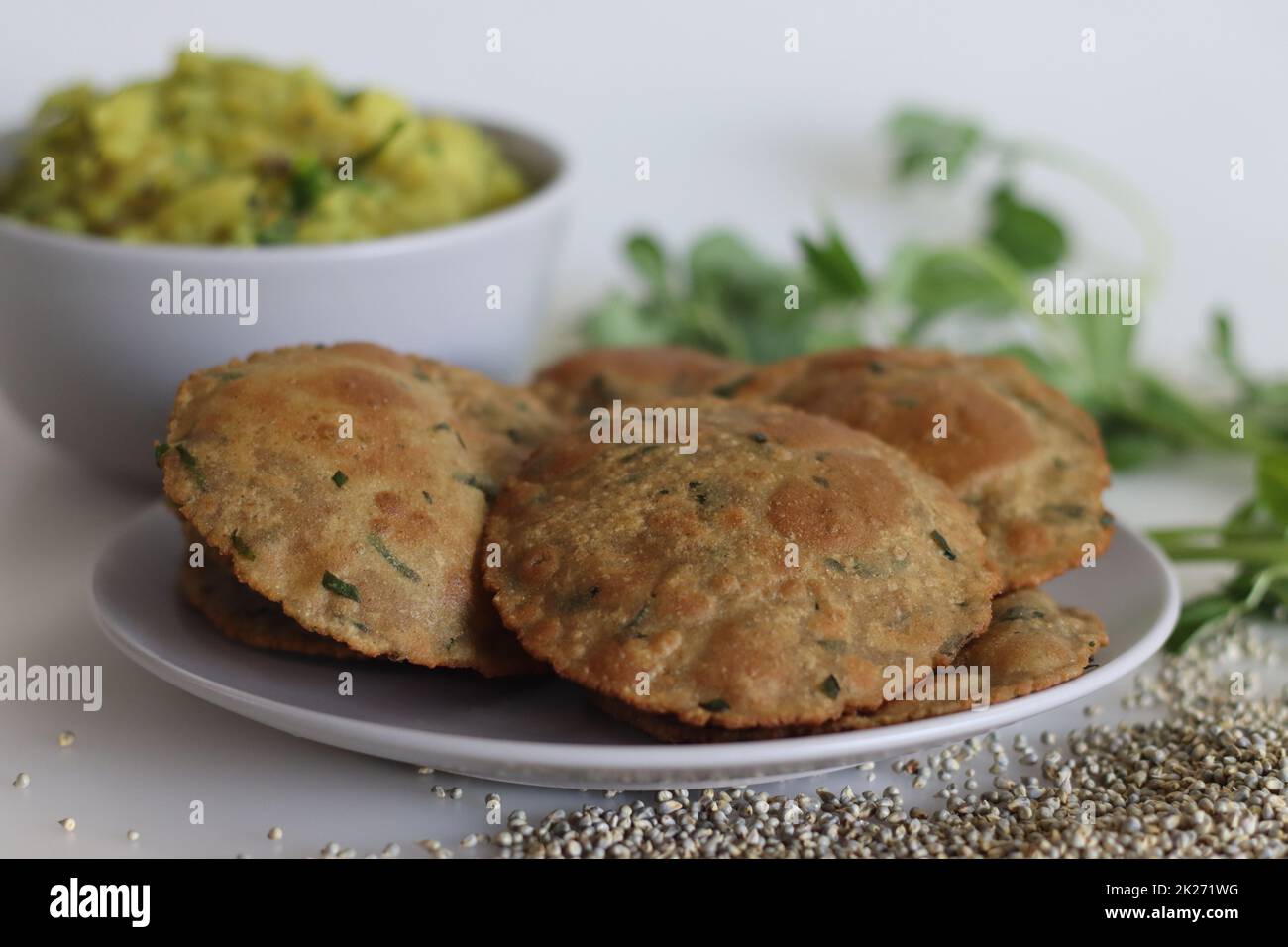 Bajra methi puri. Deep fried Indian flatbread made of pearl millet