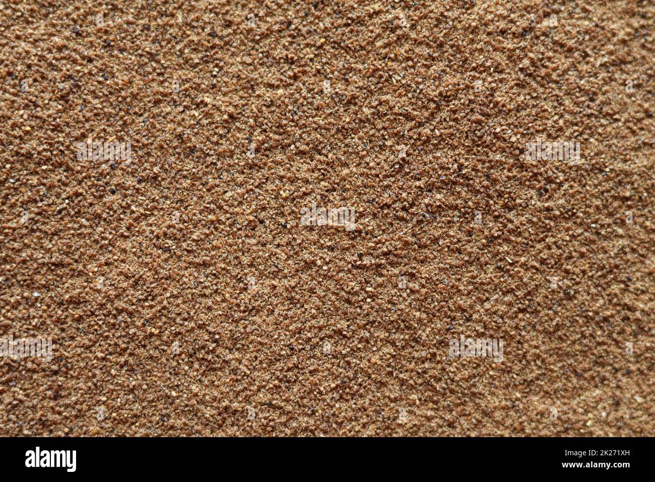 Fish meal and finely ground grains are mixed for use as a seasoning or ...