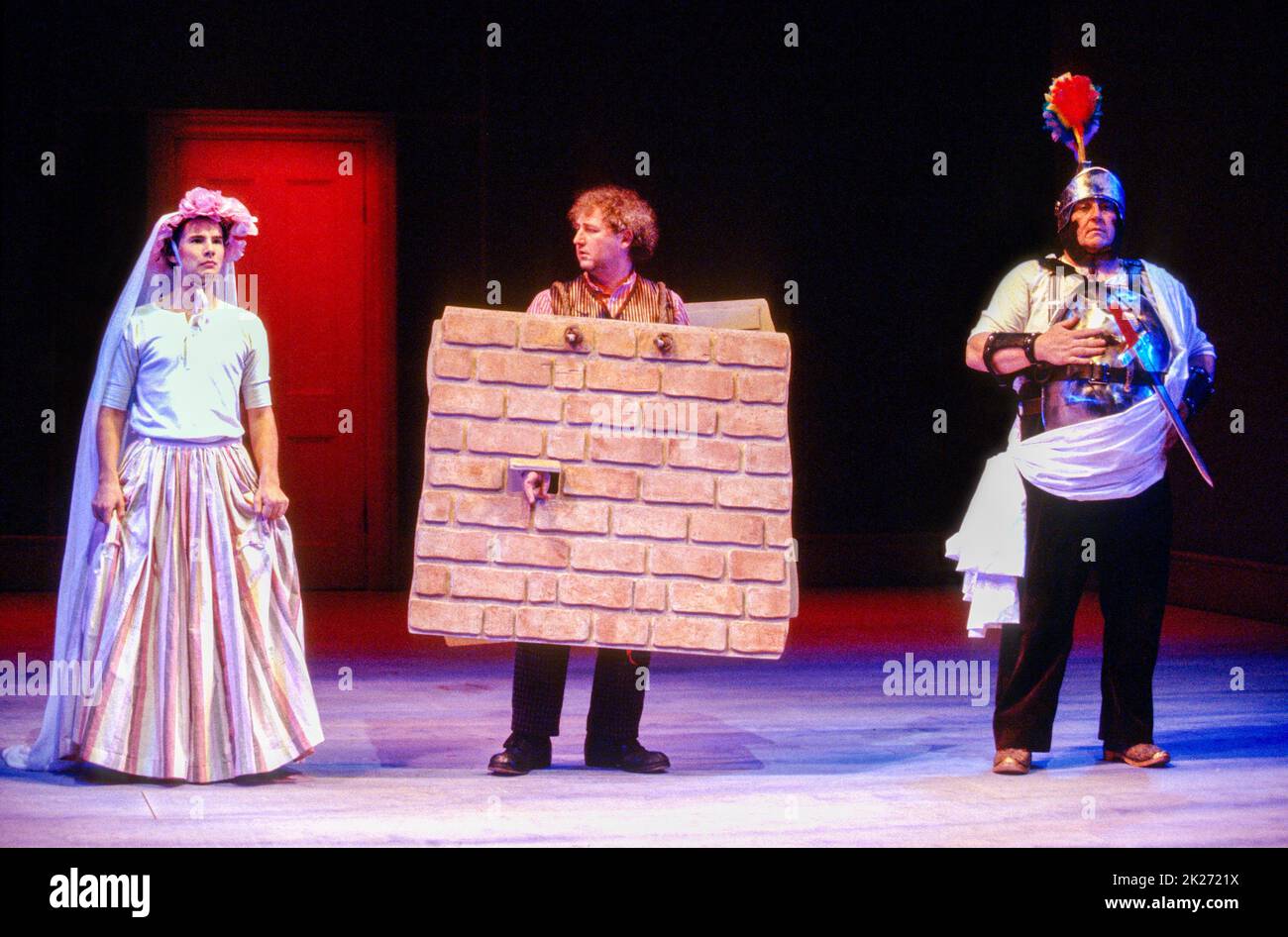 l-r: Daniel Evans (Francis Flute / Thisby), Howard Crossley (Tom Snout / Wall), Desmond Barrit (Bottom / Pyramus) in A MIDSUMMER NIGHT'S DREAM by Shakespeare at the Royal Shakespeare Company (RSC), Barbican Theatre, London EC2  25/04/1995  music: Ilona Sekacz  design: Anthony Ward  lighting: Chris Parry  movement: Sue Lefton  director: Adrian Noble Stock Photo