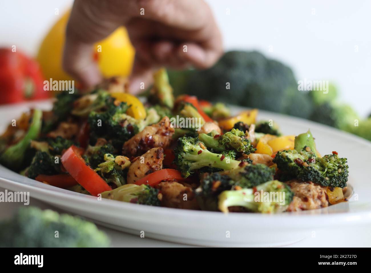 Stir fried vegetables with chicken. Air fried chicken cubes tossed with