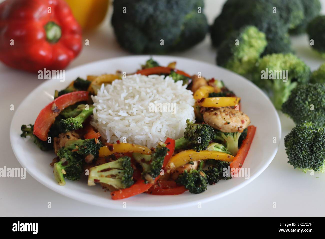 Stir fried vegetables with chicken. Air fried chicken tossed with