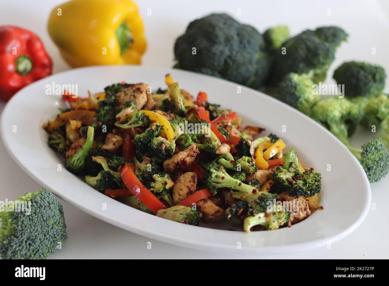 Stir fried vegetables with chicken. Air fried chicken cubes tossed with