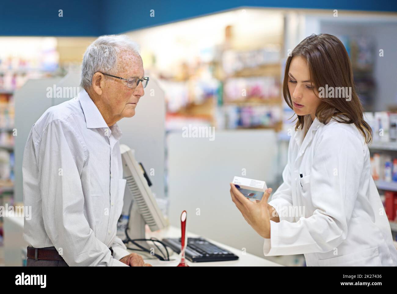 Filling prescriptions and customer's needs. Shot of a young pharmacist