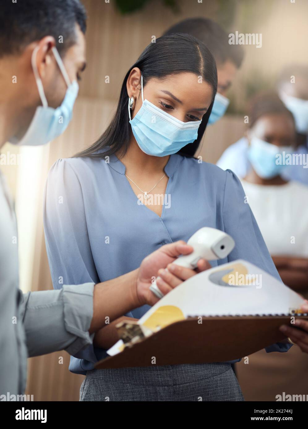 Once the screening is done, she can get to work Stock Photo