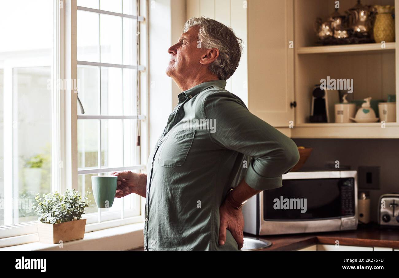 Can't wait to get rid of this back pain Stock Photo