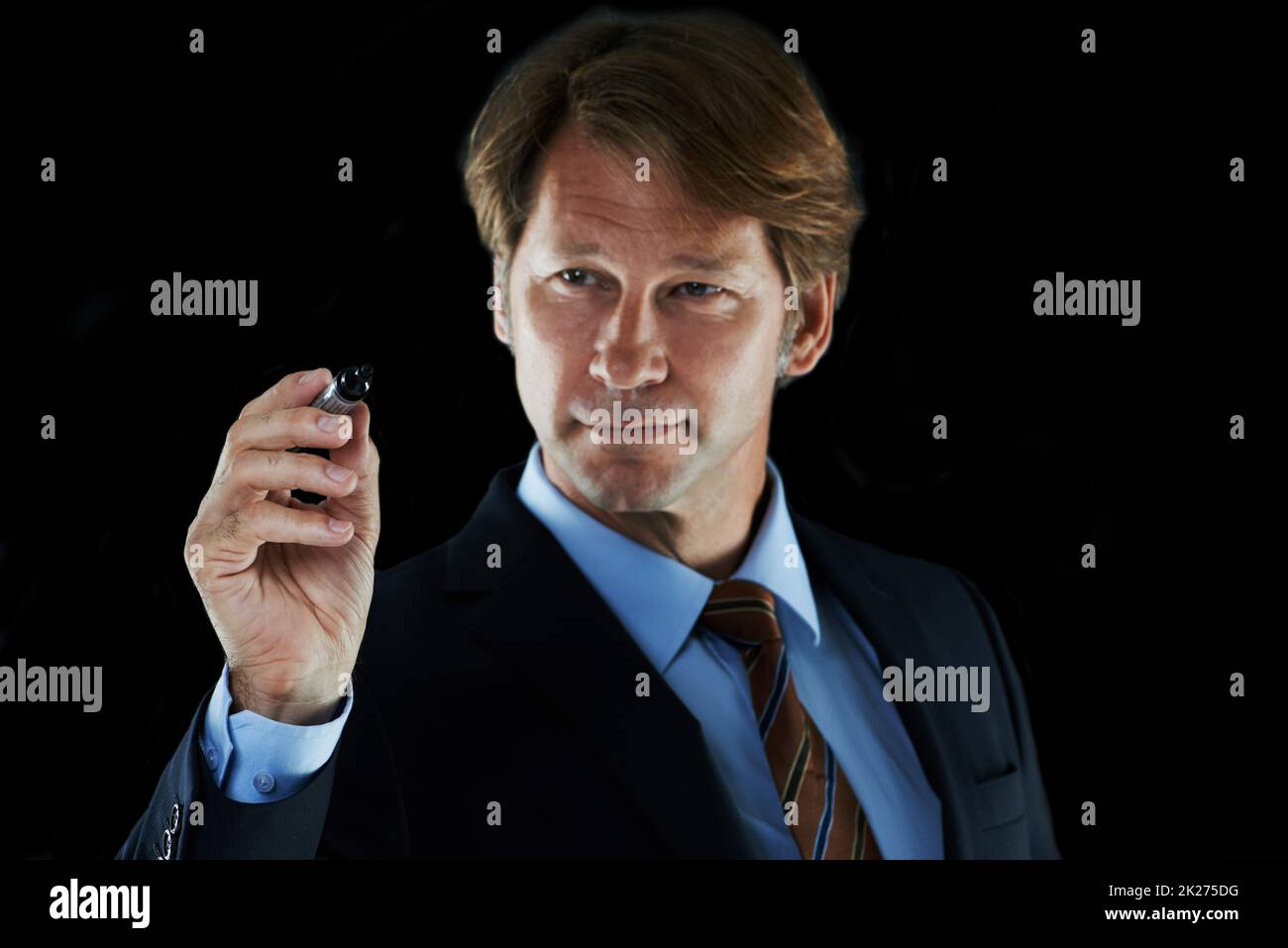Time to chart my business plan. Cropped shot of a businessman holding a marker pen. Stock Photo