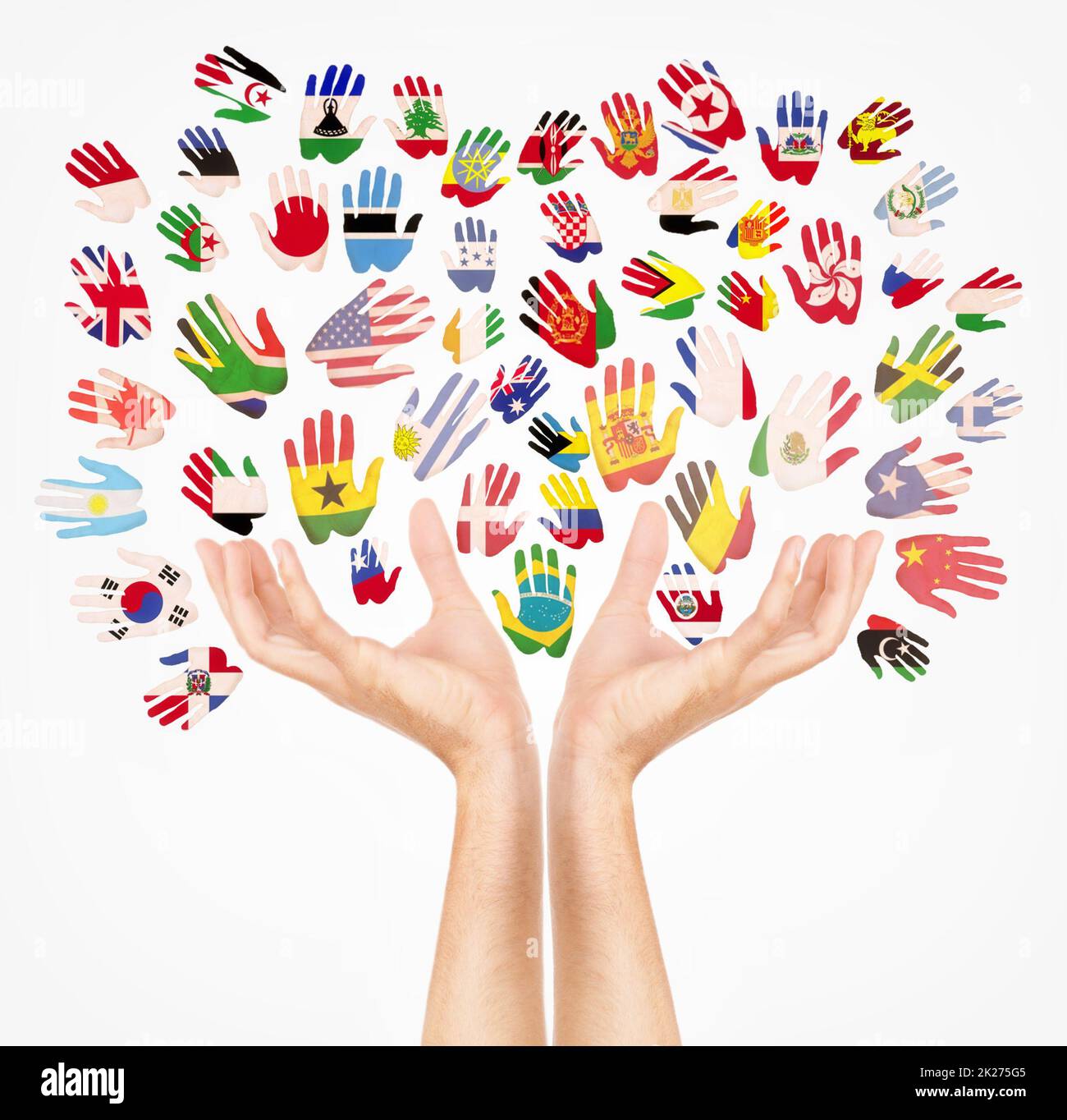 Holding your concept. Concept shot of hands forming a tree with more hands forming leaves with flags on them. Stock Photo