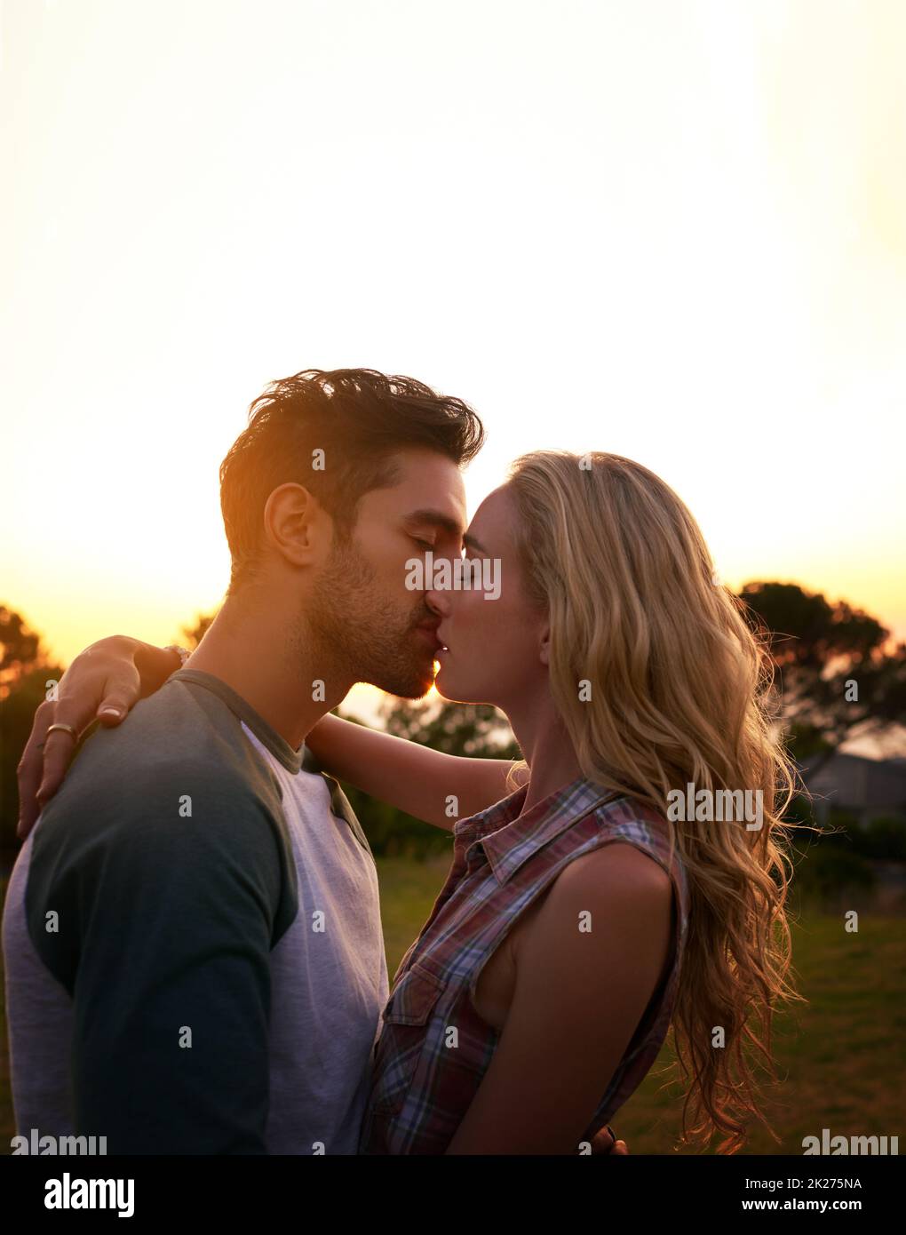Swept up in the romance. Cropped shot of an affectionate young couple outdoors. Stock Photo