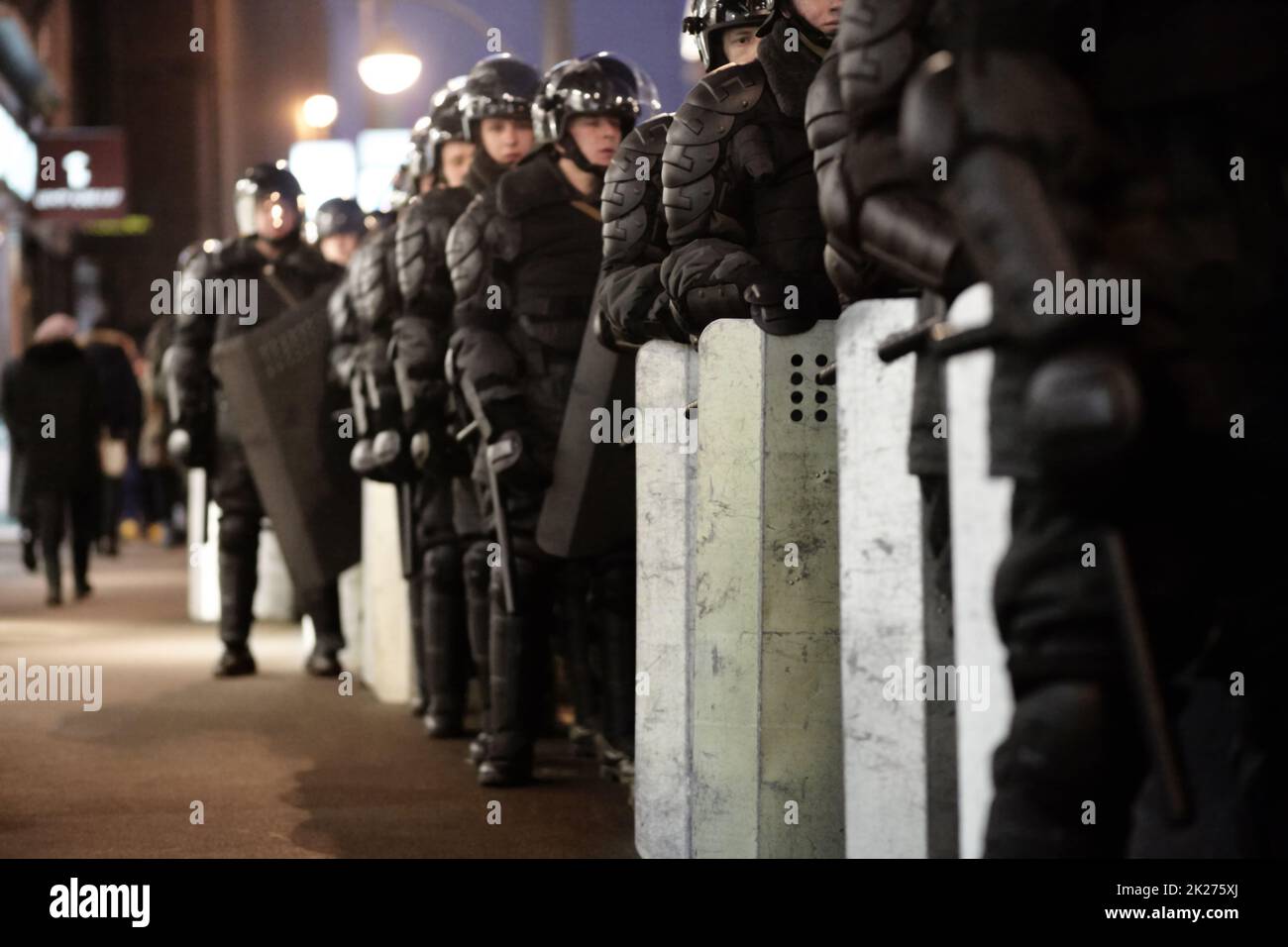 Here to create peace not voilence. The army barricading a riot in the city. Stock Photo