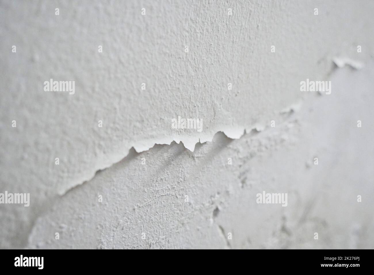 Paint swelling on the wall due to moisture, damp wall samples, damp