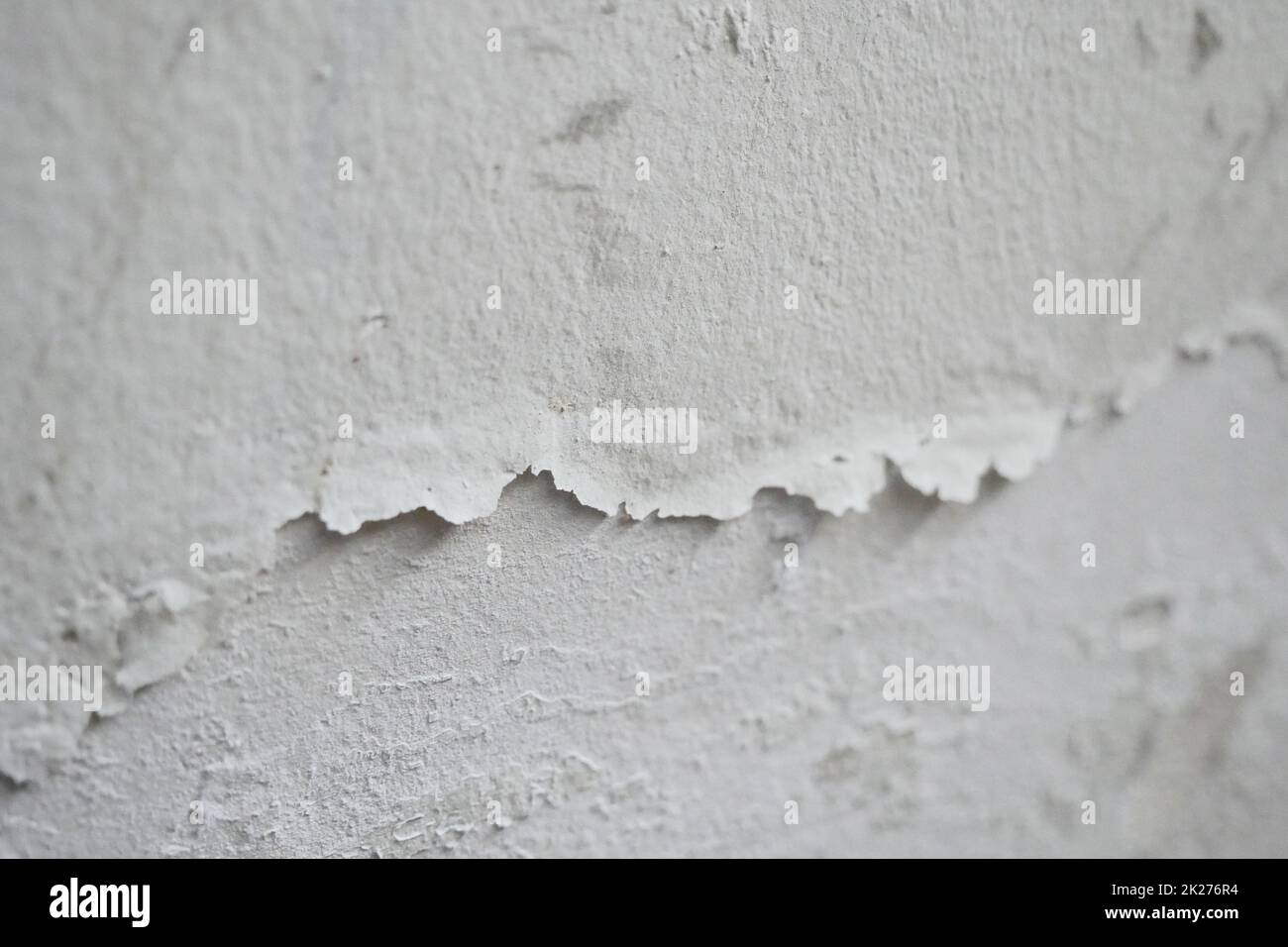 Paint swelling on the wall due to moisture, damp wall samples, damp