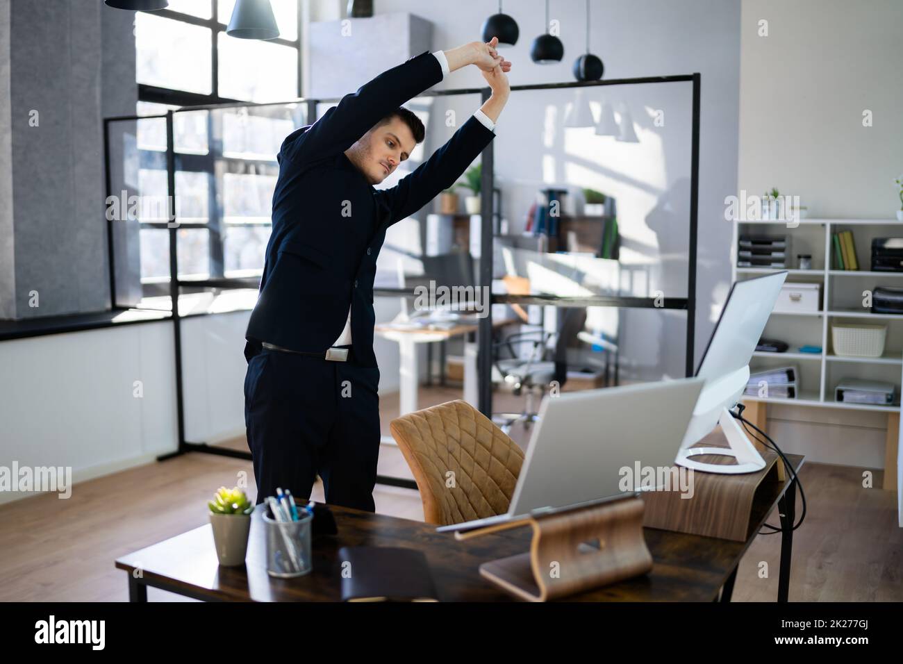 Arms Stretch Exercise Standing Near Desk Stock Photo Alamy