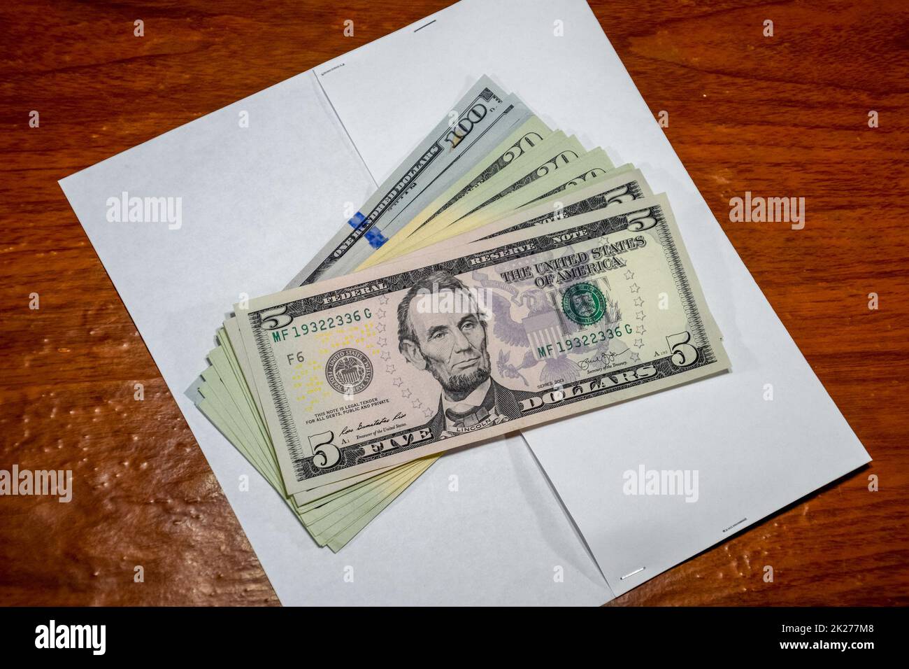 Dollars on table with an envelope. Money in an envelope. U.S. dollars Stock Photo Alamy