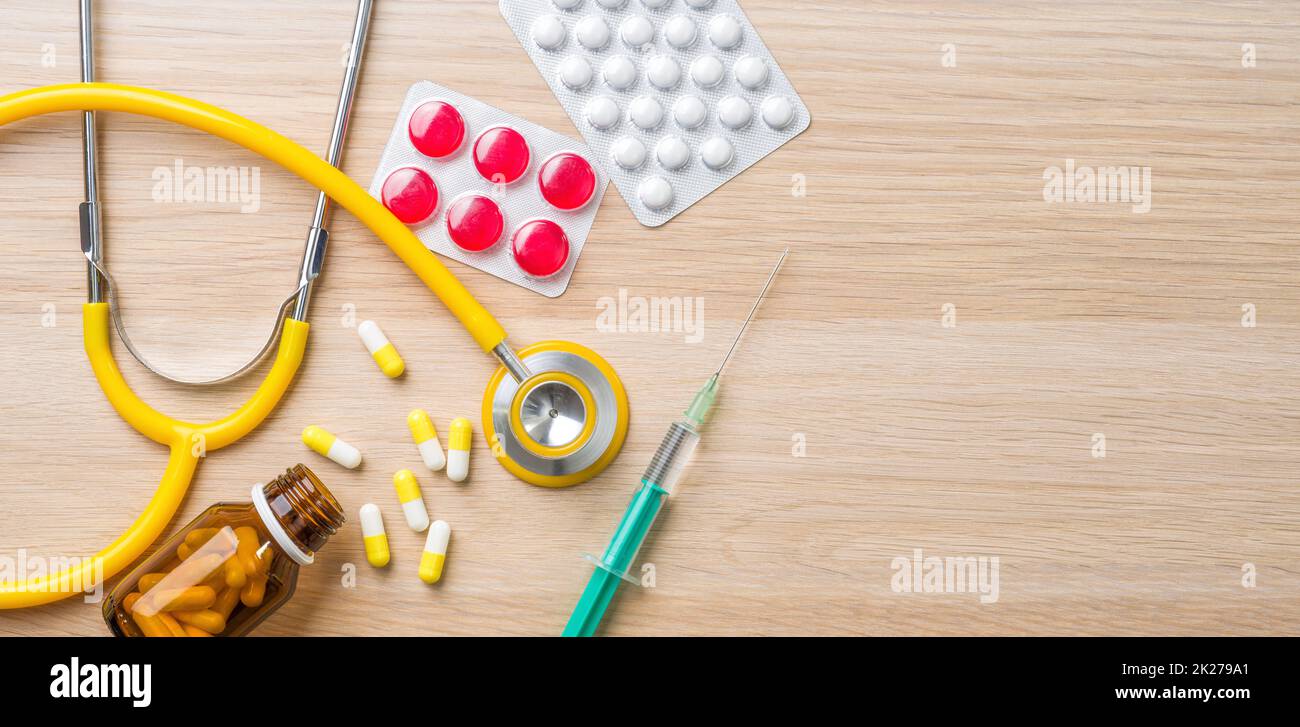Stethoscope and pharmaceuticals with copy space Stock Photo