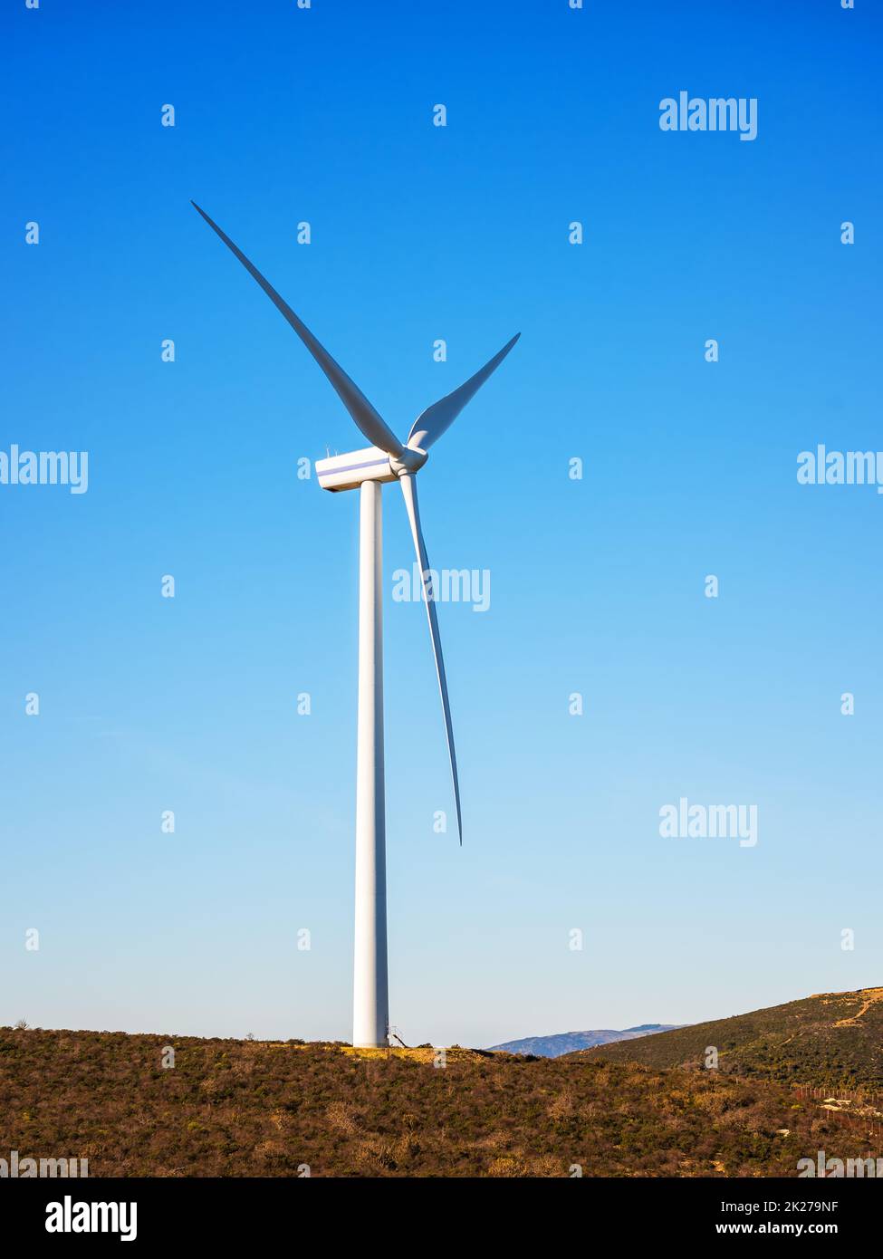 Turbines in a mountain wind farm. Ecological energy production Stock