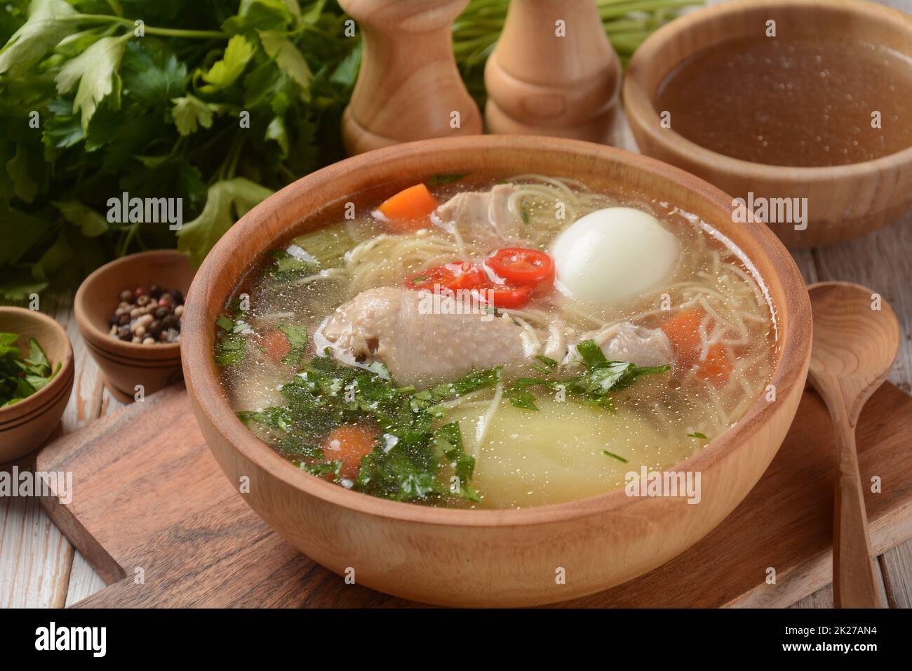 South American Caldo de Gallina chicken noodle soup with boiled egg and