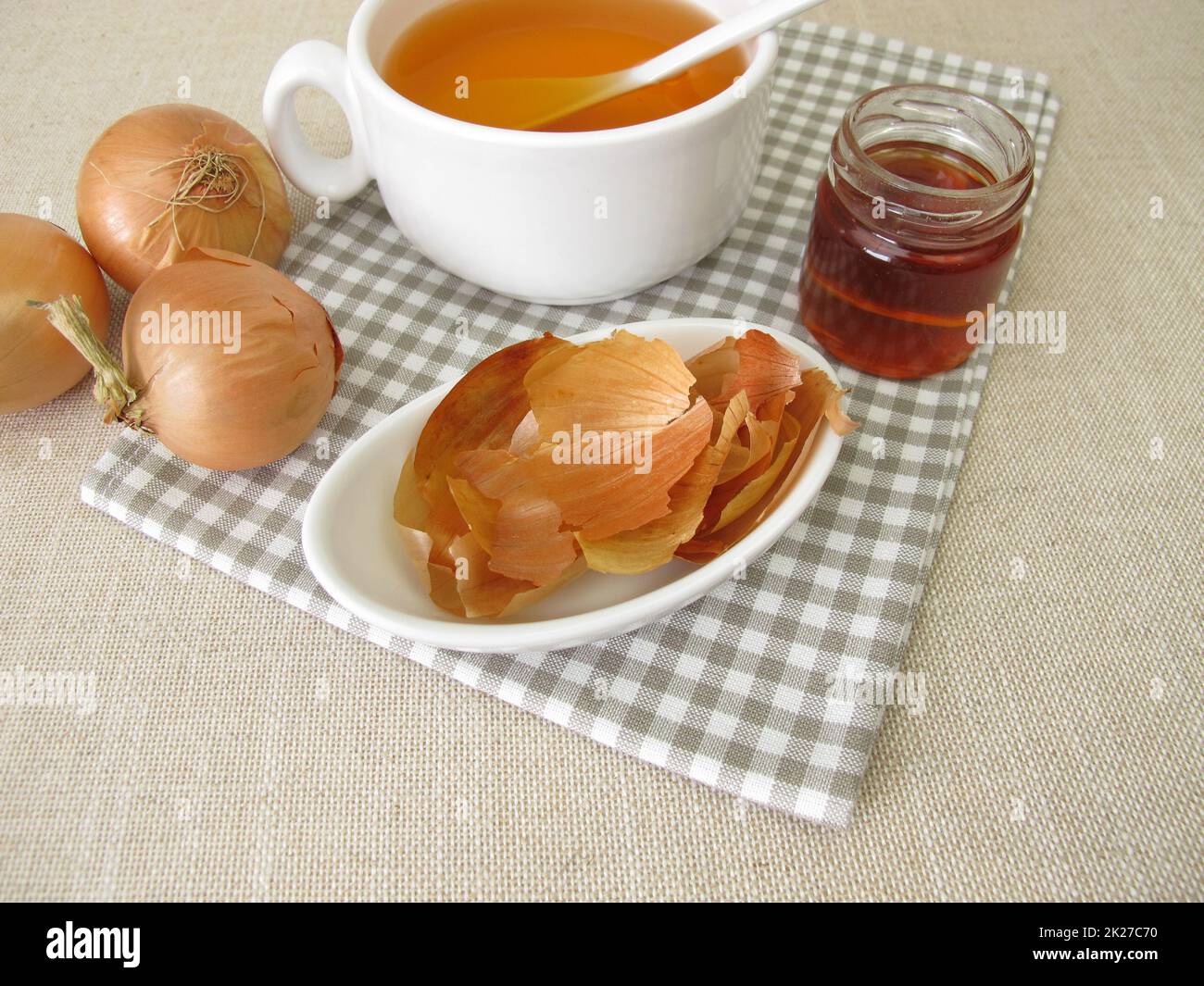A cup of onion peel tea with honey Stock Photo Alamy
