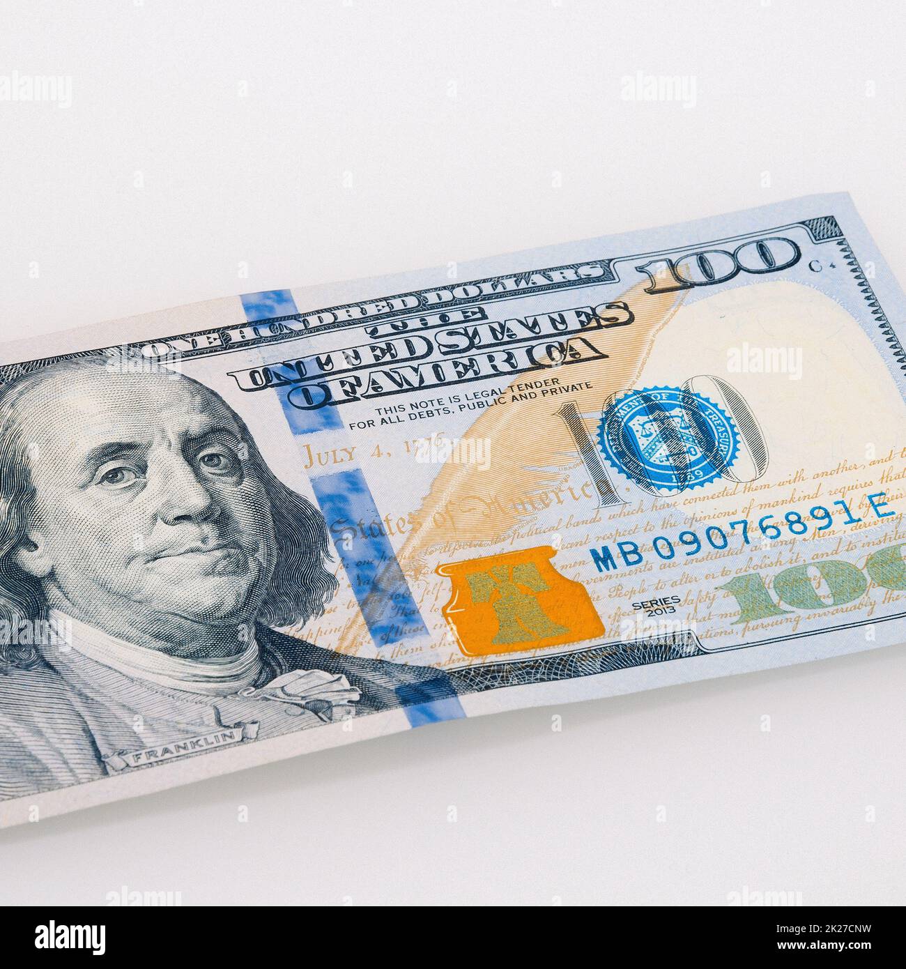One hundred dollar cash bill on a light background. Stock Photo