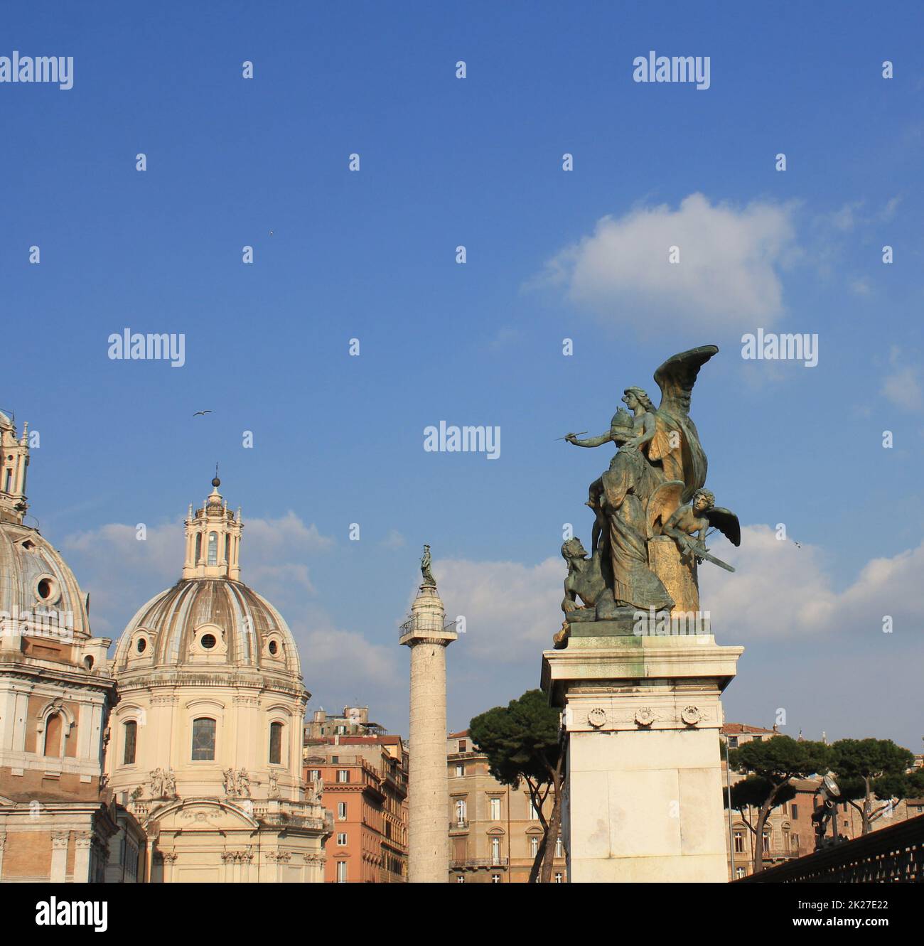 Santa Maria di Loreto church and statue in front of National Monument of Victor Emmanuel II, Rome, Italy Stock Photo