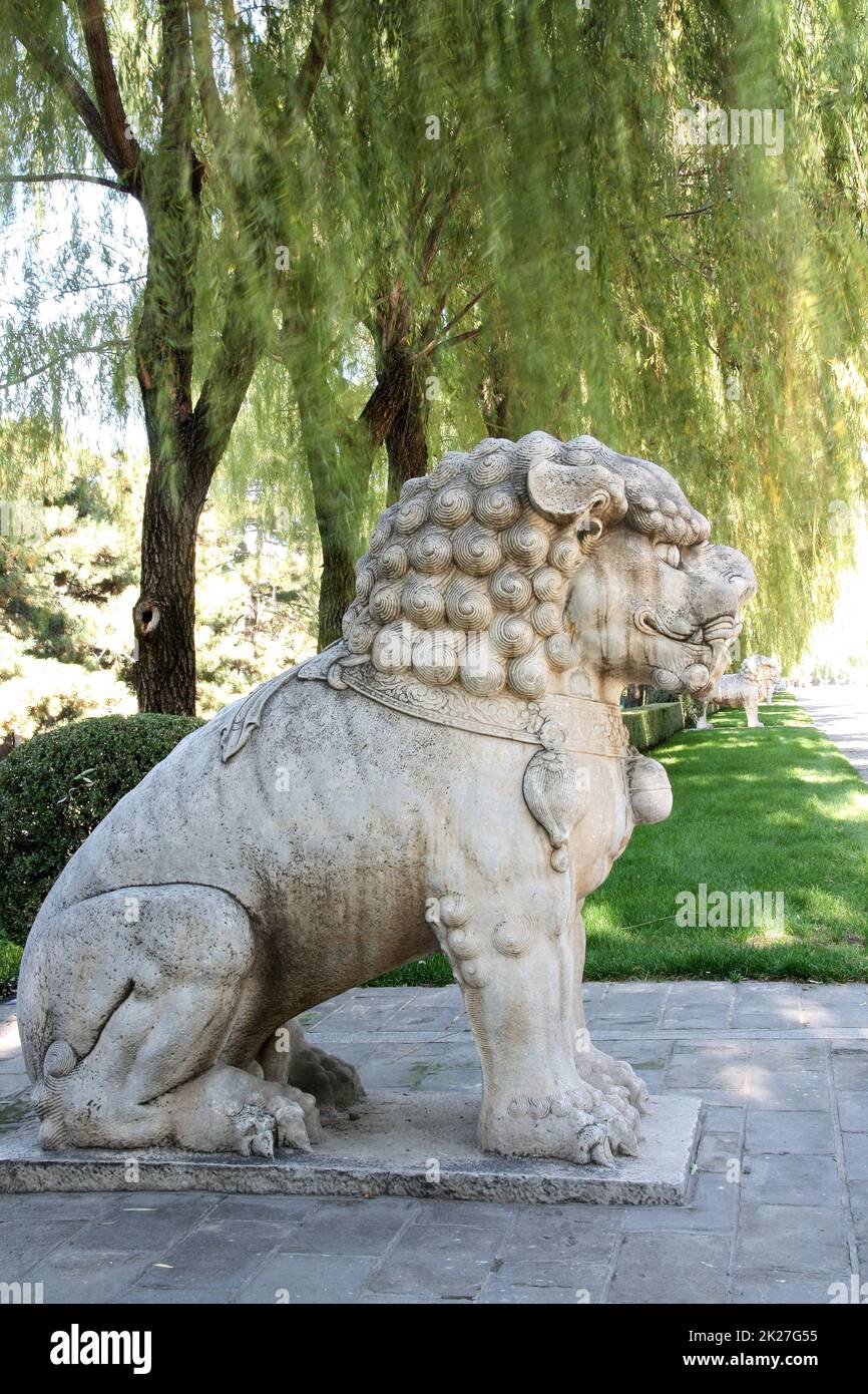 Lion statue on the Ming Tomb Alley in Beijing Stock Photo - Alamy