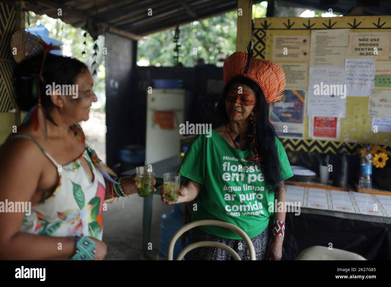 Tereza Arapium, from the Arapium indigenous people,  candidate for Rio de Janeiro state deputy for the Rede Sustentabilidade party, talks to Indigenous Potira at the Aldeia Maracana in Rio de Janeiro, Brazil September 22, 2022. REUTERS/Pilar Olivares Stock Photo