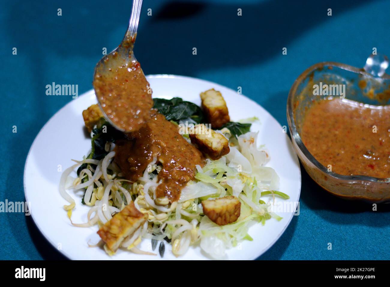 Pecel is a traditional Javanese salad with peanut sauce Stock Photo - Alamy