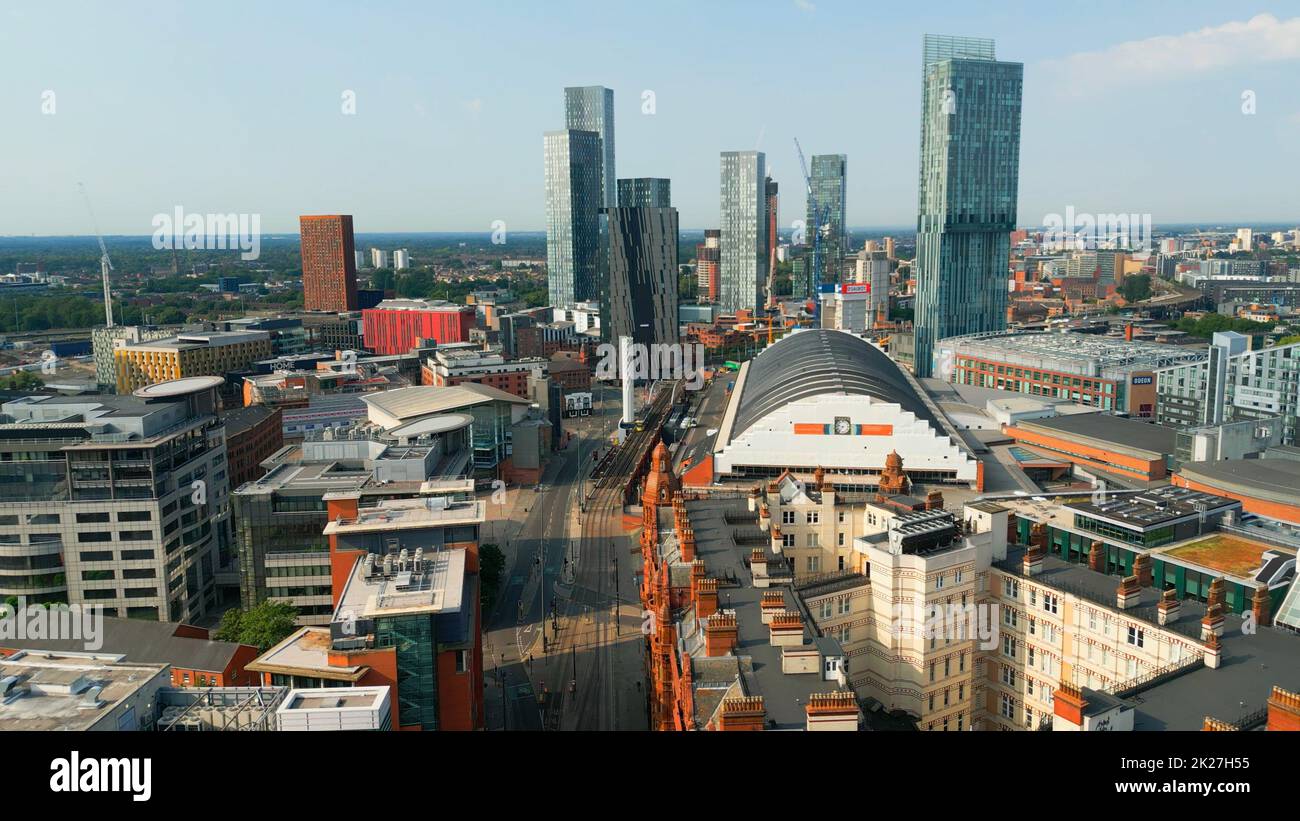 Flight over the city centre of Manchester - aerial view - MANCHESTER, UK - AUGUST 15, 2022 Stock Photo