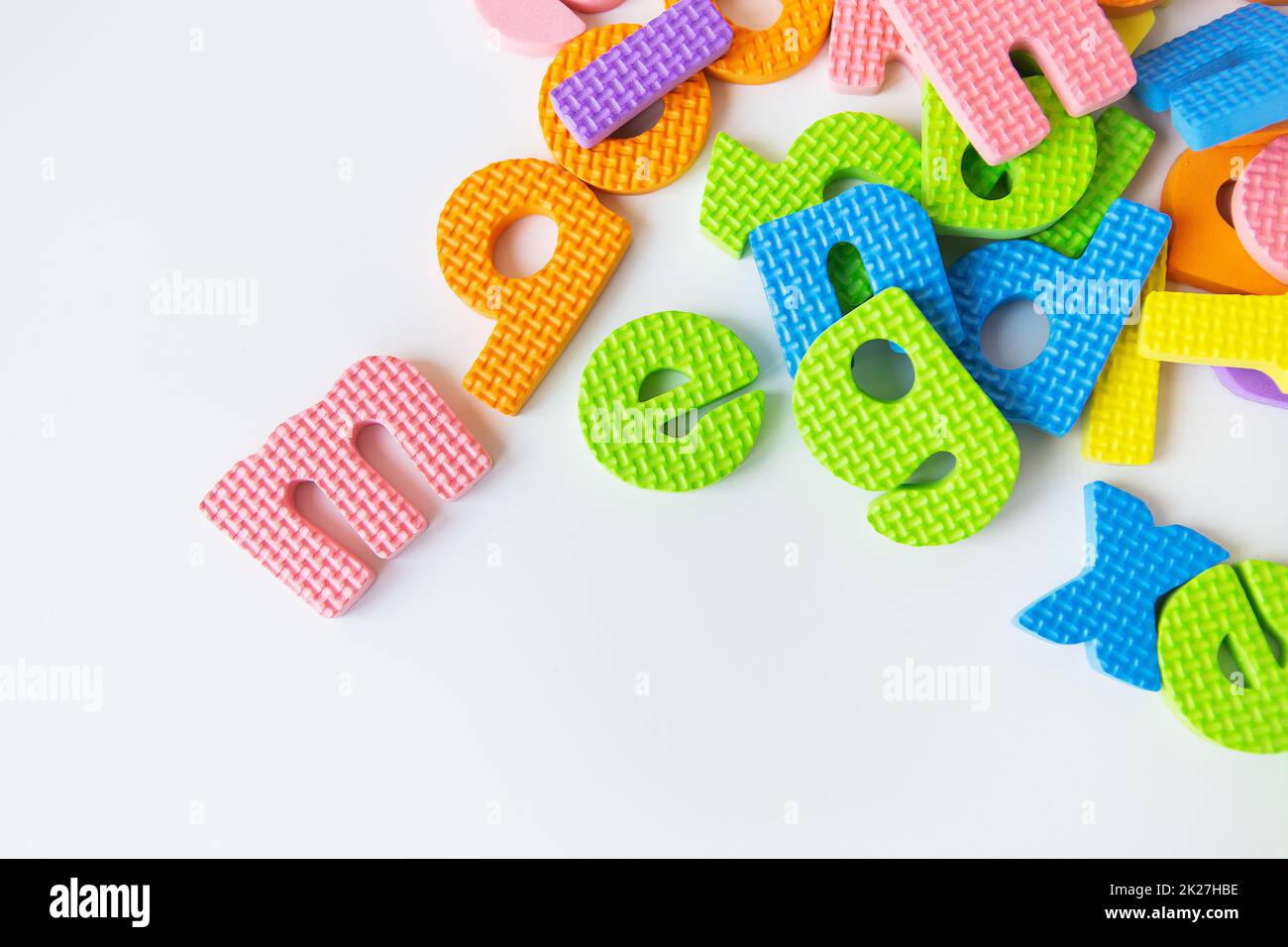 Multicolored letters. Letters for the study of children in kindergarten or school, fluted letters, tactile letters. Stock Photo