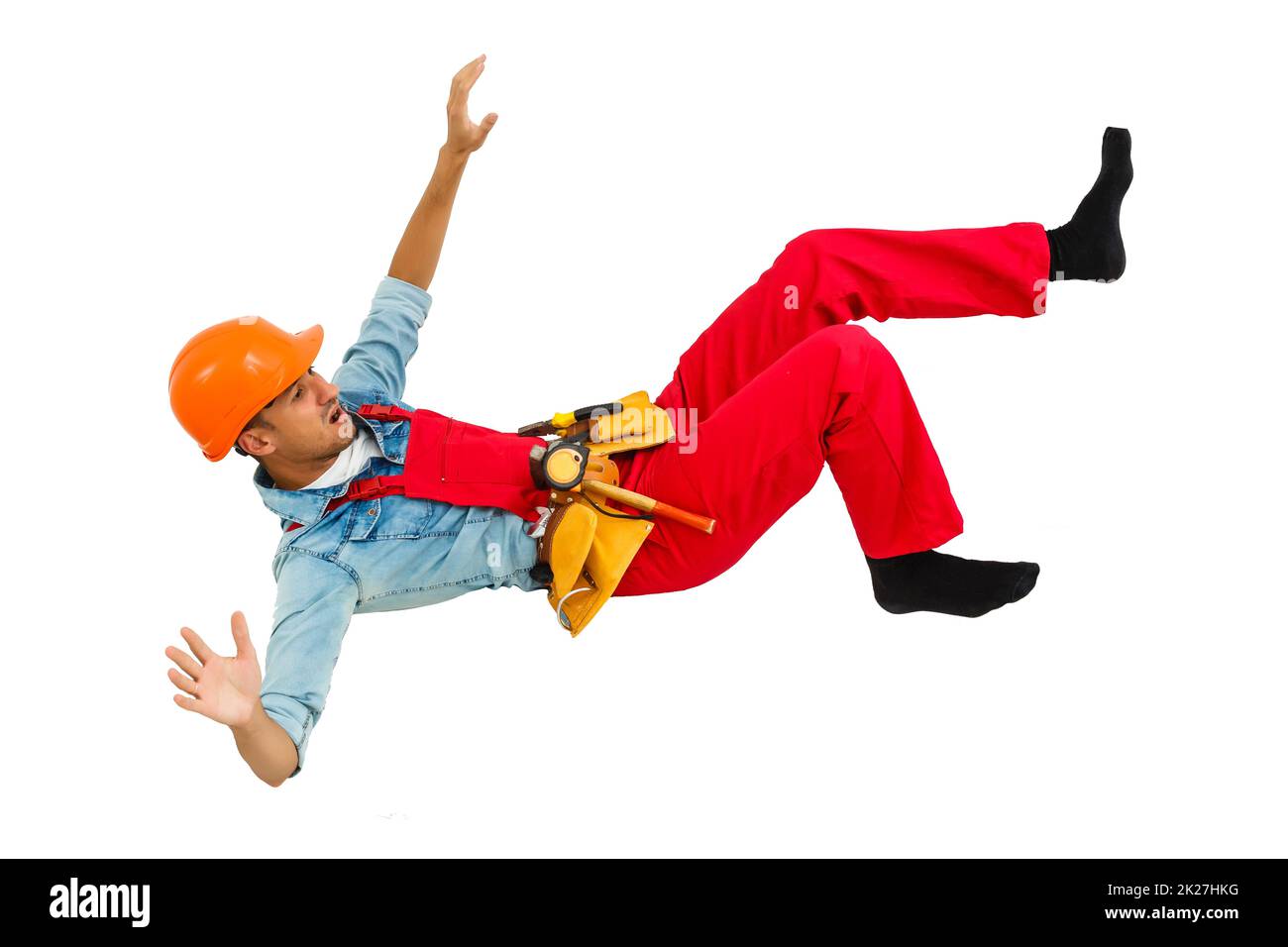 Worker with hard hat falling from ladder isolated Stock Photo Alamy