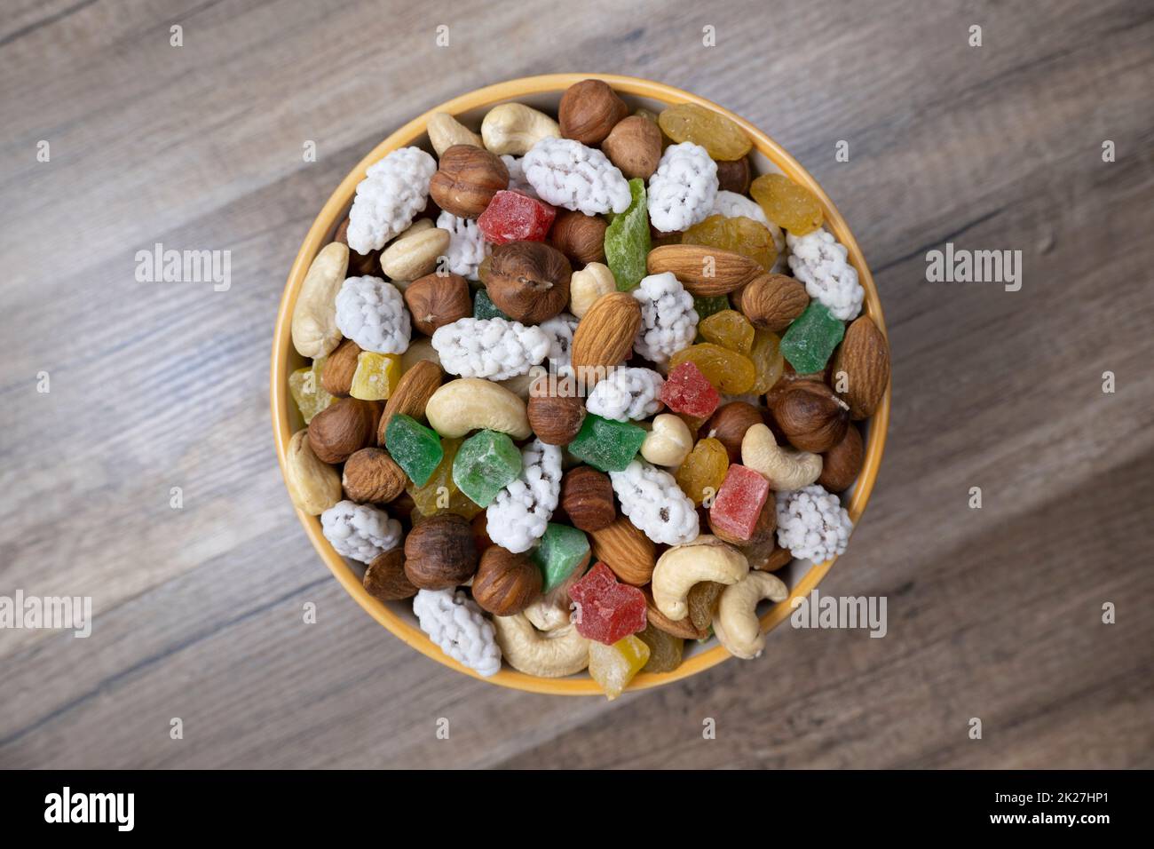 Sweets, raisin, candied fruit and nuts in a bowl Stock Photo Alamy
