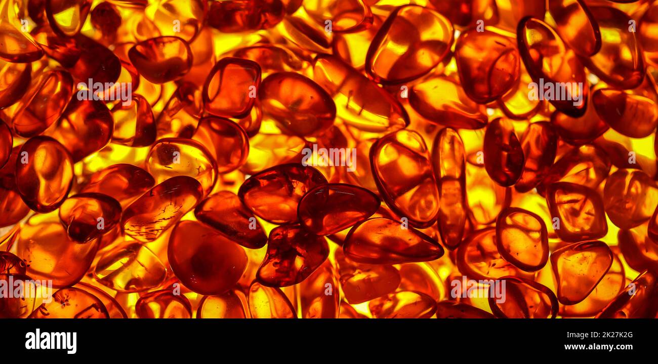 Amber in its natural form and warm color. Amber is often made into jewelry. Stock Photo