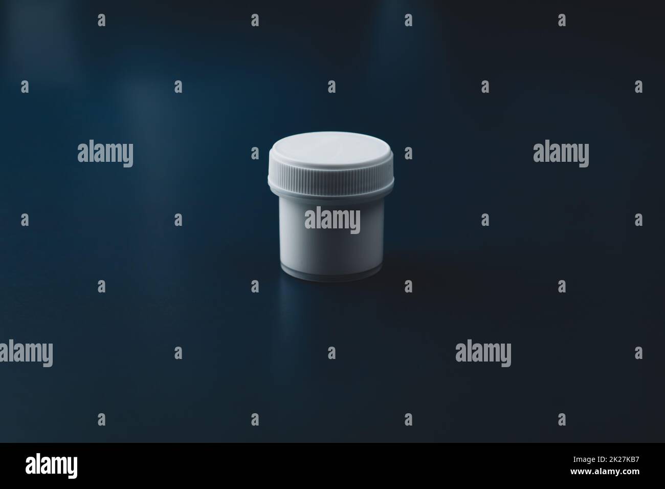 White gouache paint in a plastic jar Stock Photo Alamy