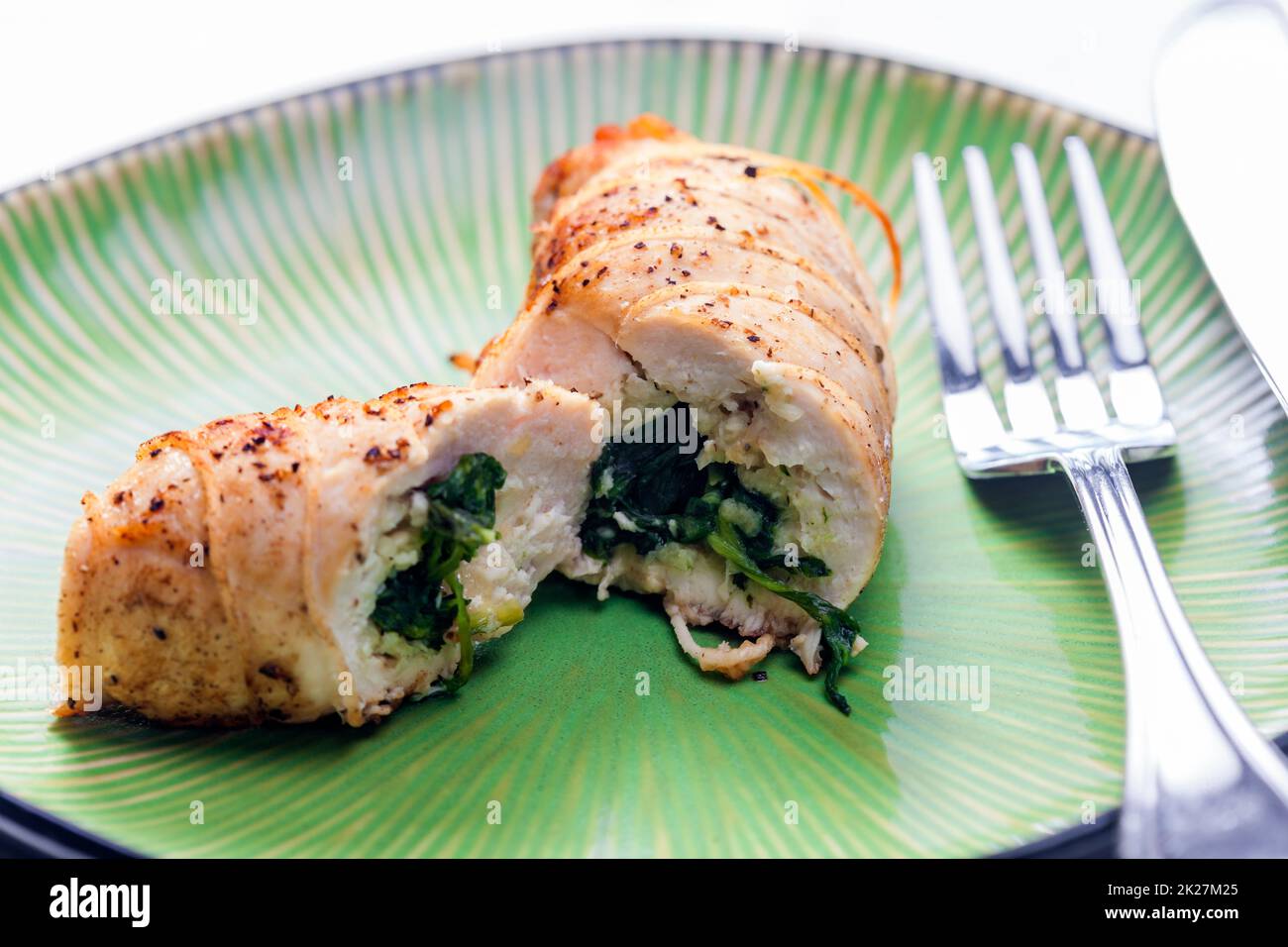poultry roulade filled with spinach Stock Photo Alamy