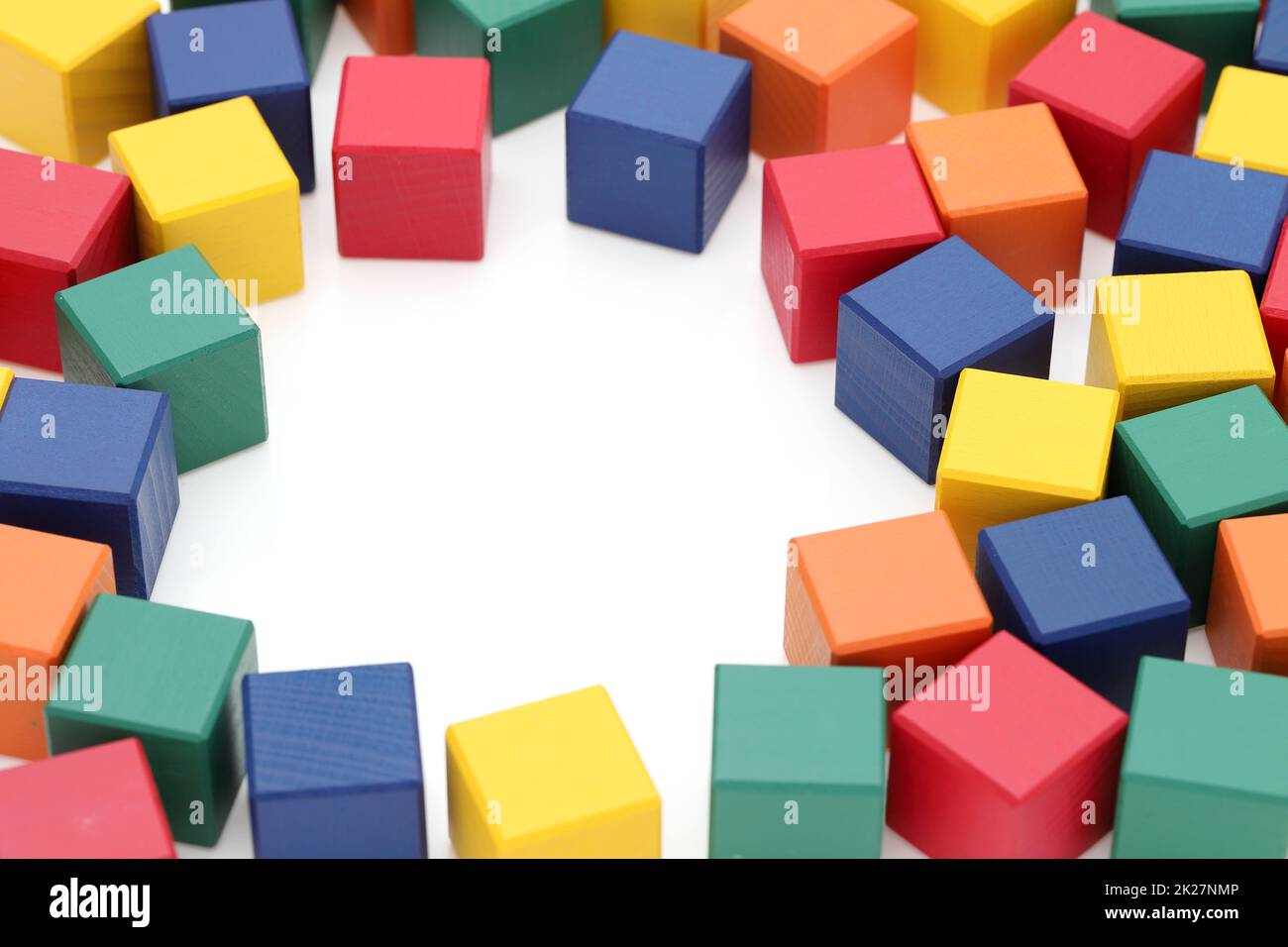 frame of colorful wooden building blocks on a white background Stock Photo