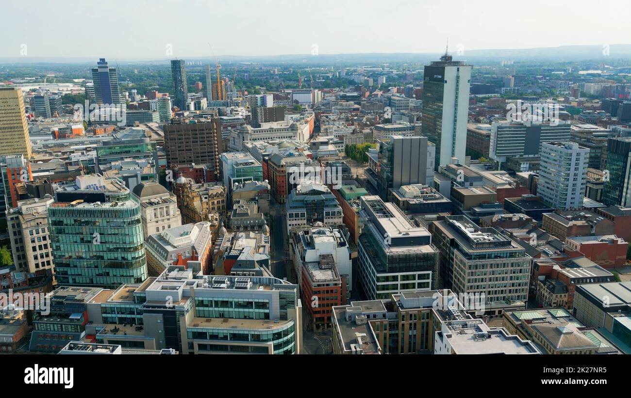 Flight over the city centre of Manchester - aerial view - MANCHESTER, UK - AUGUST 15, 2022 Stock Photo