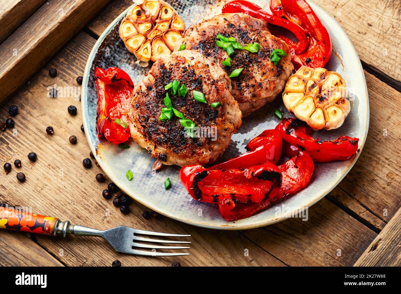 Fried beefsteak in bacon Stock Photo