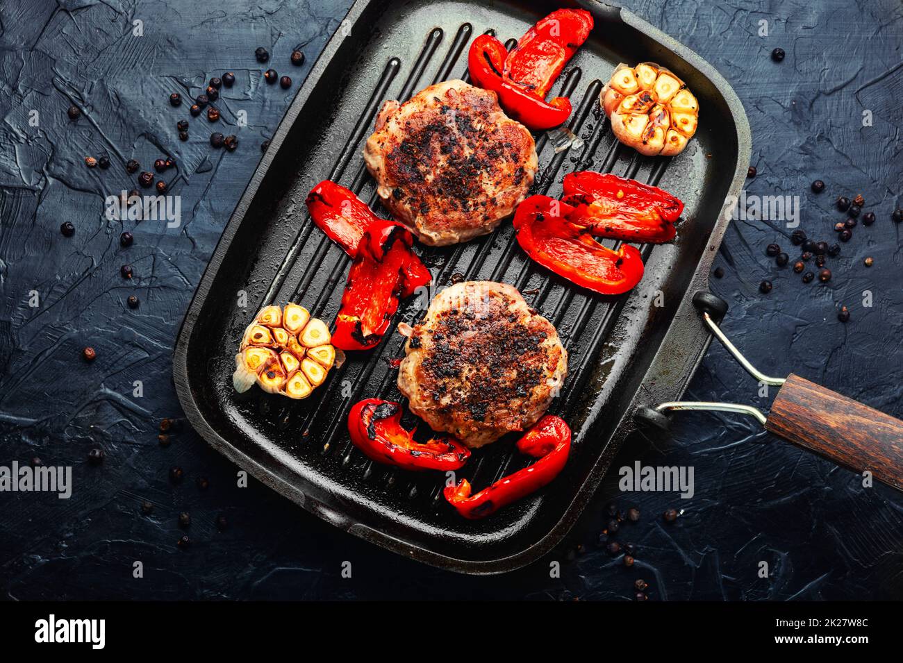 Fried beefsteak in bacon Stock Photo