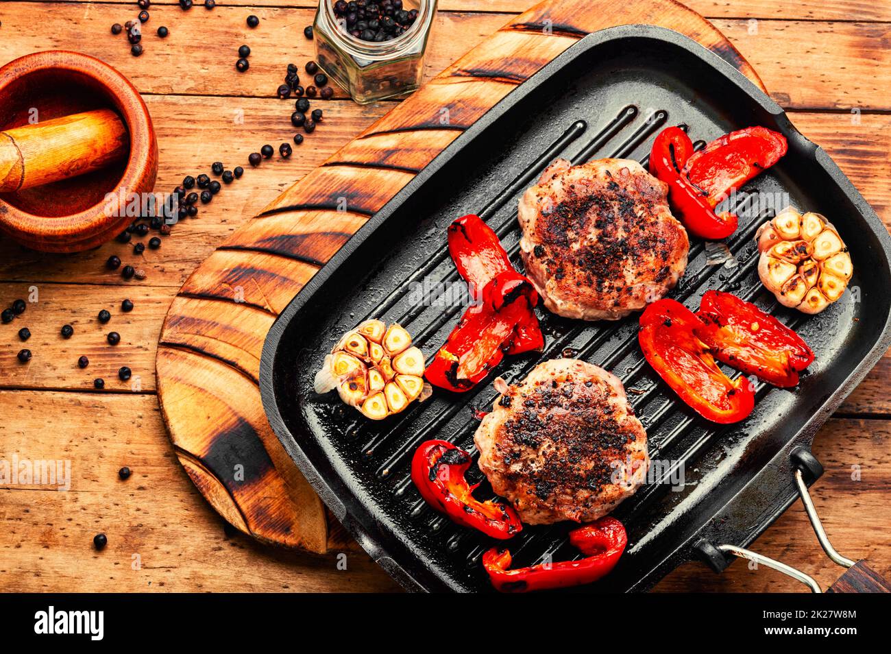 Fried beefsteak in bacon Stock Photo