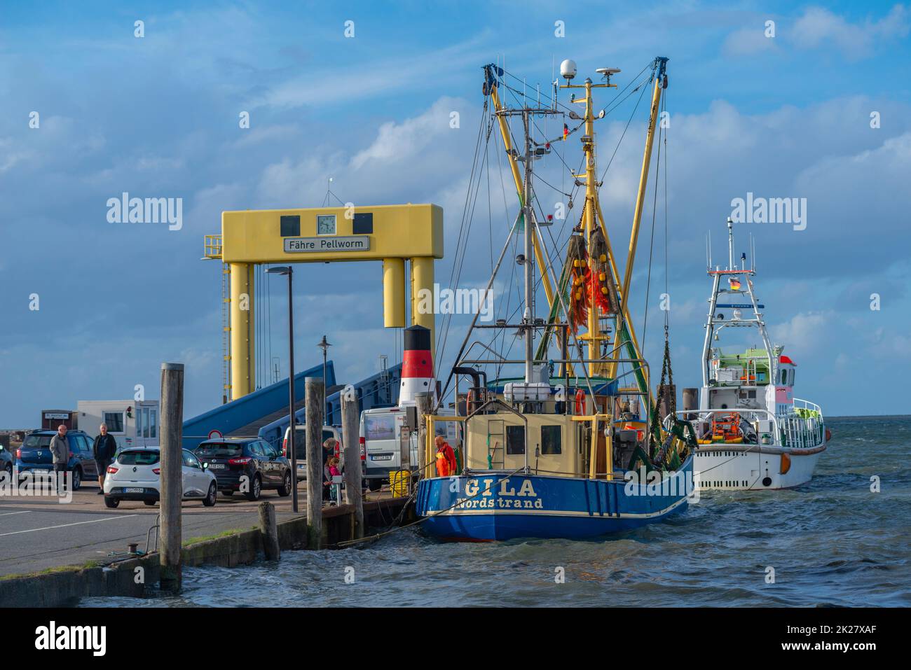 Peninsula Nordstrand, harbor in Strucklahnungshörn with passenger ferry and fishing boat, , North Frisia, Schleswig-Holstein, Northern Germany, Stock Photo