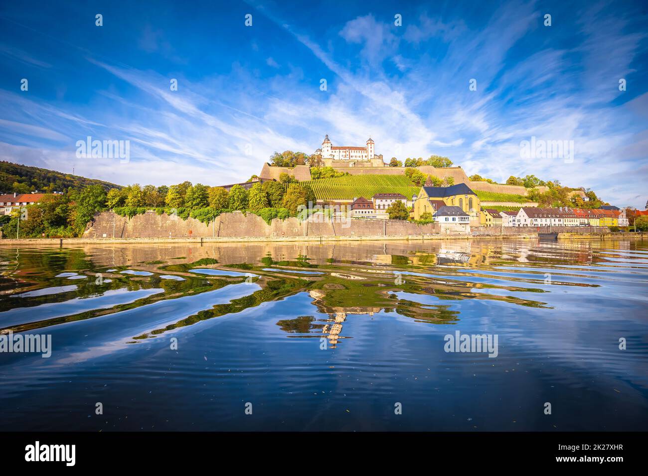 Main river mirror view of scenic Wurzburg castle and vineyards Stock Photo