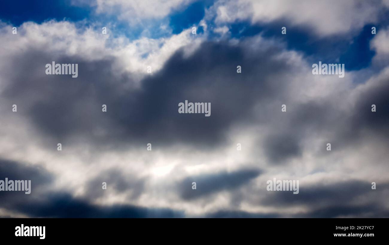 Background of dark clouds before a thunderstorm. Stock Photo